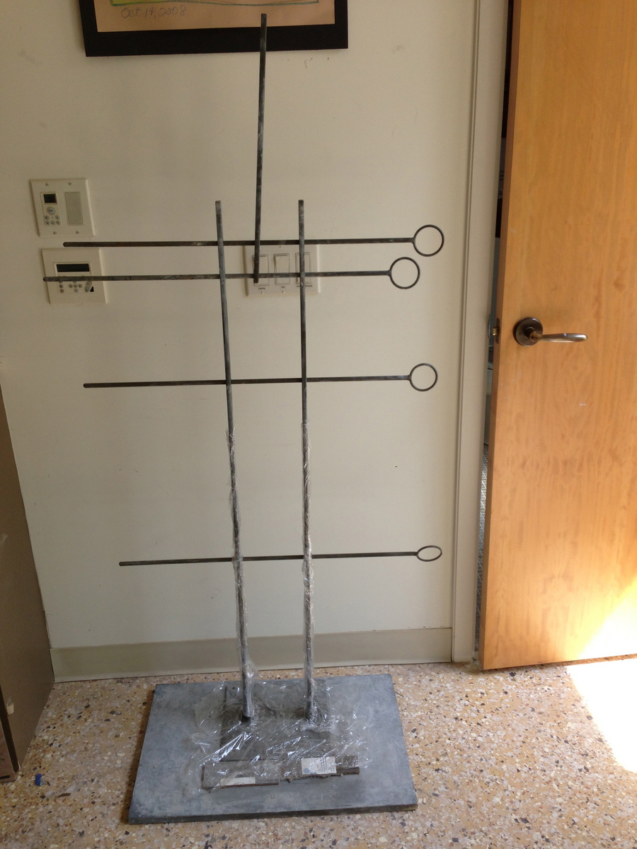 This is the "armature" I started with - a heavy steel plate with flatbars welded on and rods through holes in the bars.
